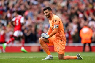 Hugo Lloris of Tottenham Hotspur looks dejected after Granit Xhaka of Arsenal (not pictured) scores their sides third goal during the Premier League match between Arsenal FC and Tottenham Hotspur at Emirates Stadium on October 01, 2022 in London, England.