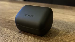 Sony Inzone Buds case on a wooden table