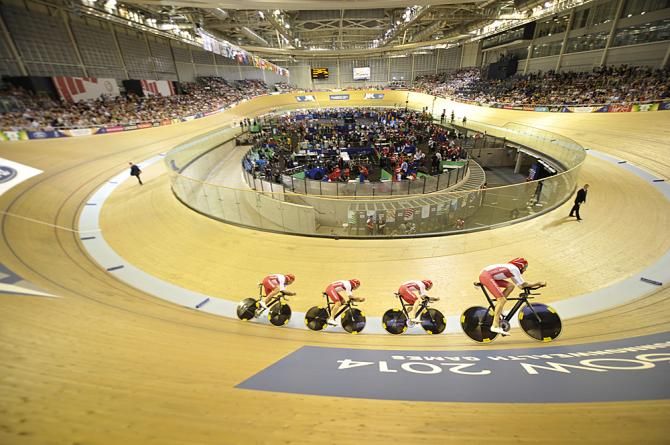England takes second in the men's team pursuit with Bradley Wiggins, Steven Burke, Andy Tennant and Ed Clancy