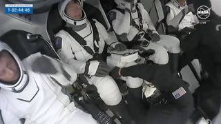 The four astronauts of SpaceX's Crew-8 mission sit aboard their Crew Dragon capsule Endeavour ahead of their planned March 3, 2024 launch. 