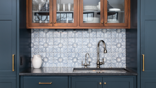 Kitchen with patterned tiles