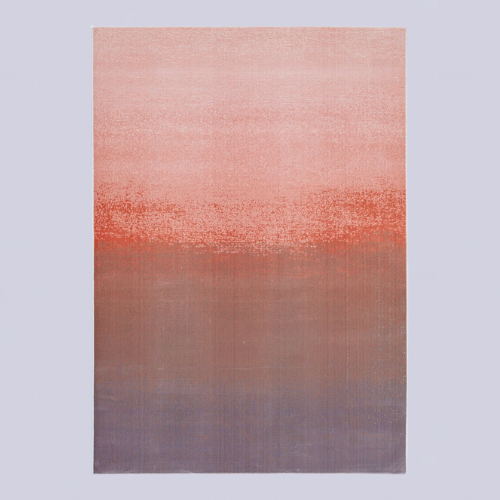A pink and mauve ombre rug