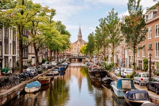 canal and boats in Amsterdam, Holland