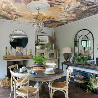 dining room with ceiling mural