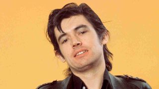Chris Spedding posing for a photograph in 1975