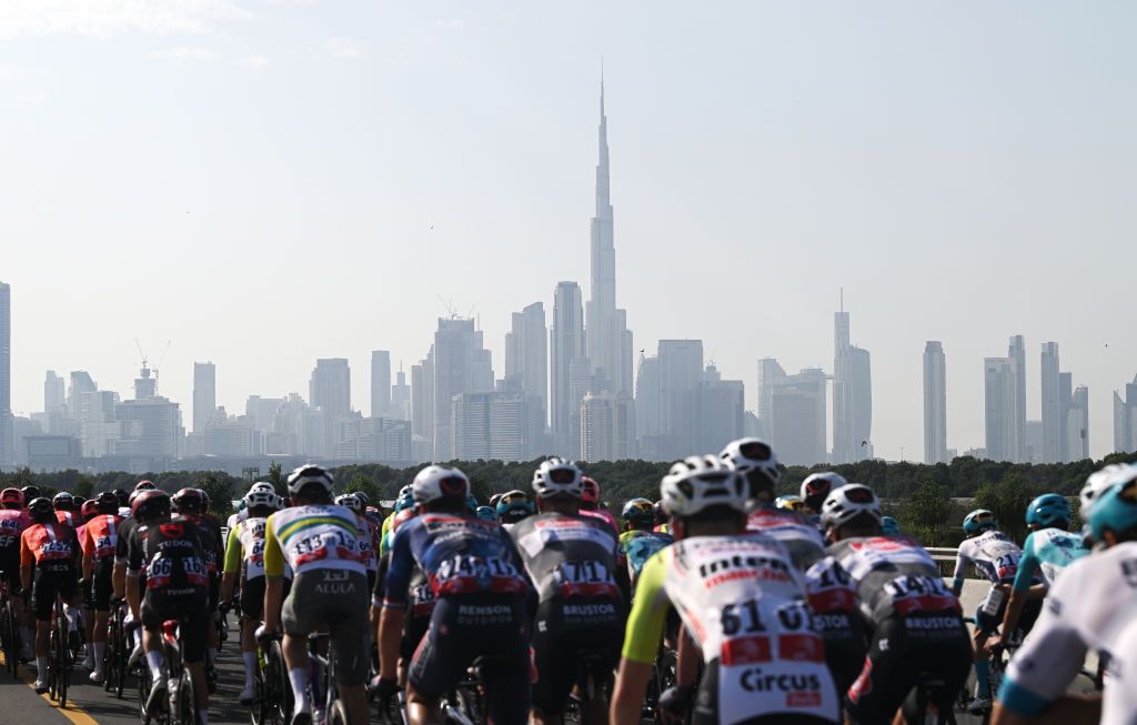 DUBAI UNITED ARAB EMIRATES FEBRUARY 21 A general view of the peloton passing through a Dubai village landscape during the 7th UAE Tour 2025 Stage 5 a 160km stage from American University Dubai to American University Dubai UCIWWT on February 21 2025 in Dubai United Arab Emirates Photo by Dario BelingheriGetty Images