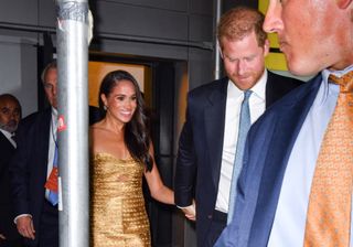 Meghan Markle, Duchess of Sussex, and Prince Harry, Duke of Sussex leave The Ziegfeld Theatre on May 16, 2023 in New York City