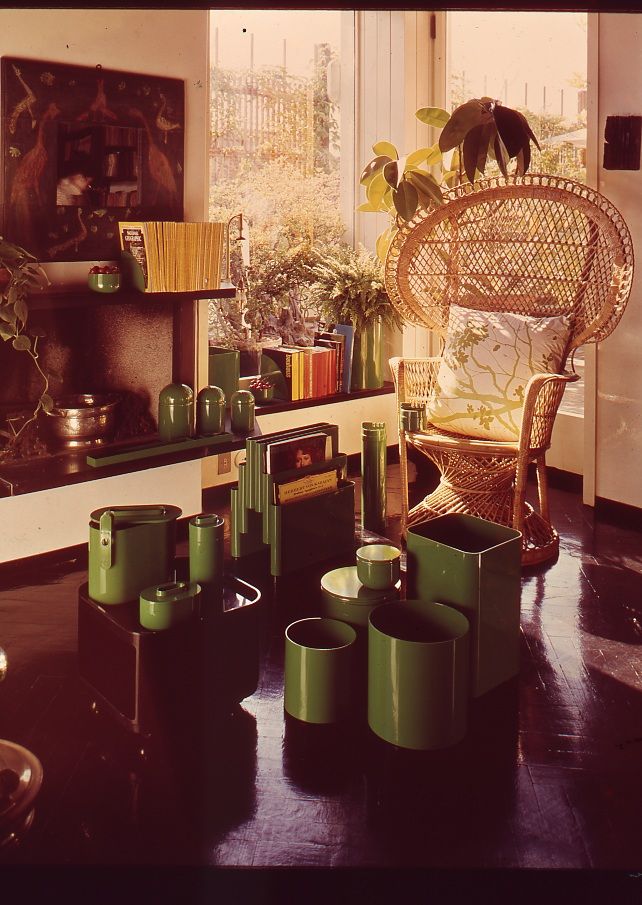 a vintage image of plastic furniture in a 70s living room