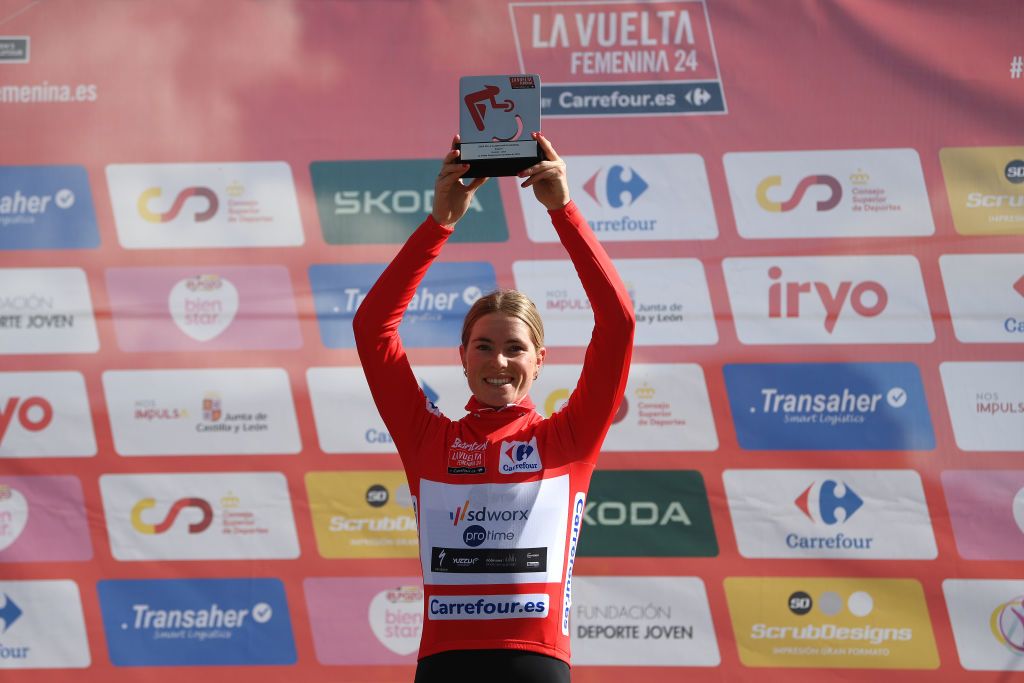 JACA SPAIN MAY 02 Demi Vollering of The Netherlands and Team SD Worx Protime celebrates at podium as Red Leader Jersey winner during the 10th La Vuelta Femenina 2024 Stage 5 a 1139km stage from Huesca to Alto del Fuerte Rapitan Jaca 1103m UCIWWT on May 02 2024 in Jaca Spain Photo by Alex BroadwayGetty Images