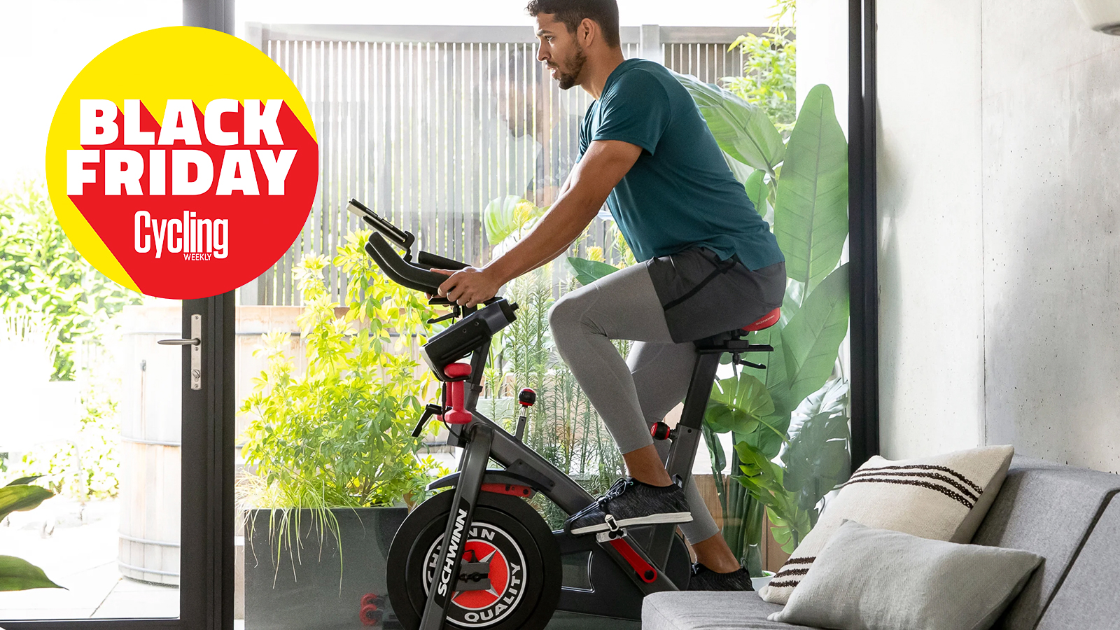 The Schwinn 800IC being ridden indoors with Cycling Weekly Black Friday logo