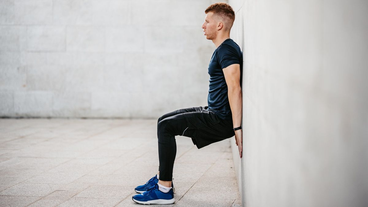 I did wall squats with arm raises every day for a week — here’s how it helped boost my posture