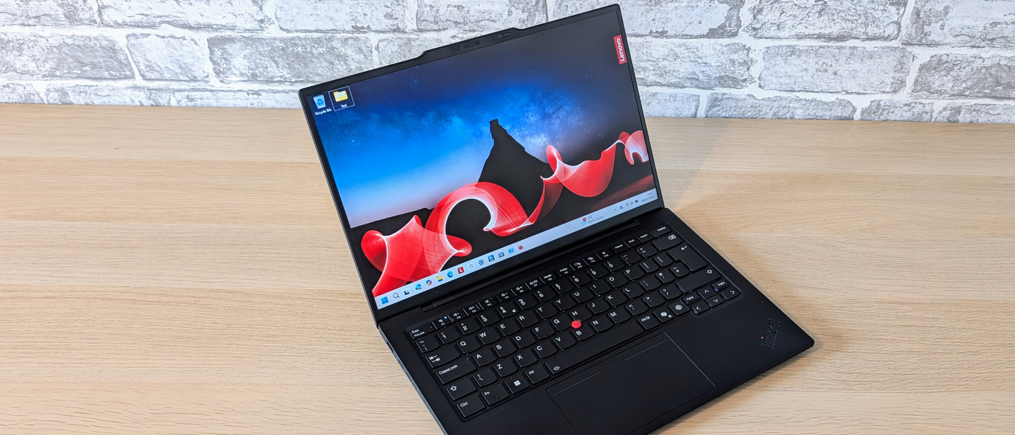 The Lenovo ThinkPad X1 Carbon Gen 13 on a desk