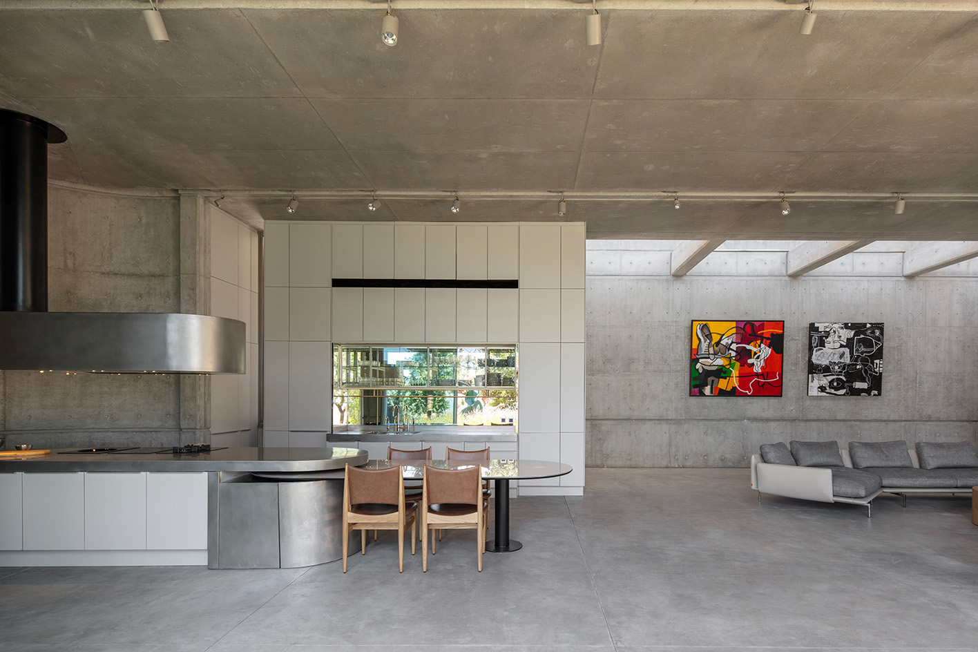 Capsule Retreat by East Architecture Studio, a concrete house in the leafy countryside with tall ceilings and minimalist interiors