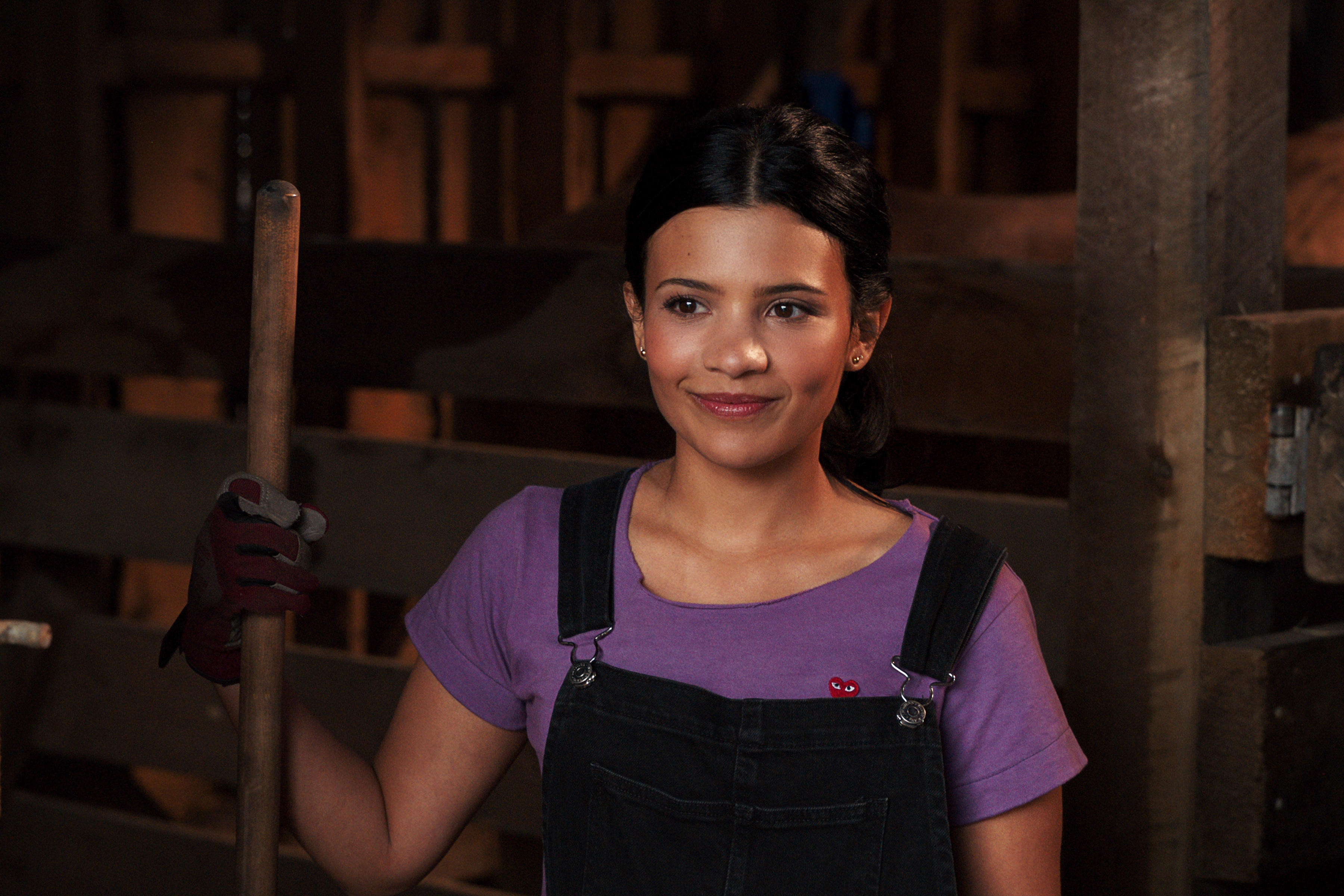 Nikki Rodriguez as Jackie in episode 203 of My Life with the Walter Boys working in the barn