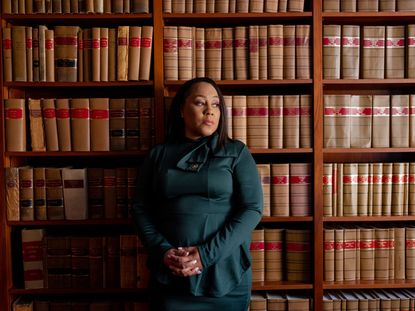 Fani Willis against a bookcase