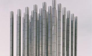 A cluster of tall slim concrete columns