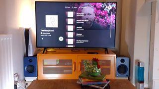 Kanto Ren speakers on a pine table