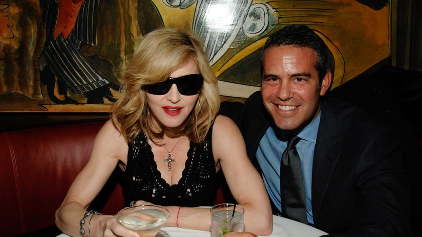 Madonna and Cohen smiling at an event in 2009.