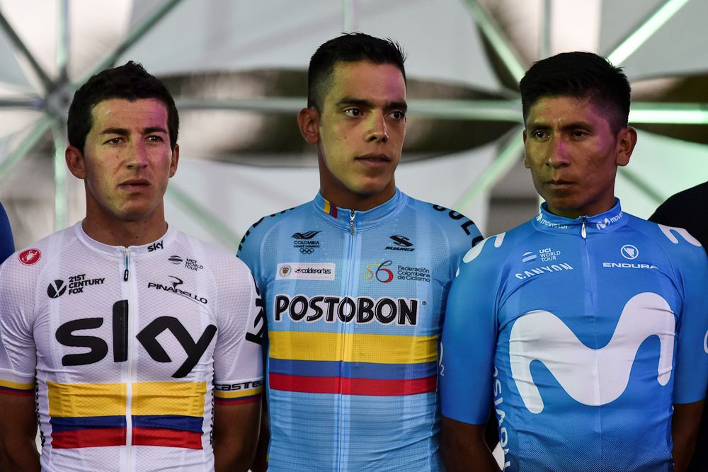 Sergio Henao of the Sky team, Jarlinson Pantano of the Colombian team and Nairo Quintana of the Movistar team take part in the team presentation ahead of the Colombia Oro y Paz