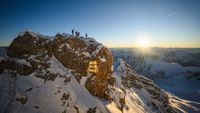 Workers prepare the site for the arrival of the golden summit cross after its refurbishment on the top of the Zugspitze (2962m) mountain near Grainau and Garmisch-Partenkirchen, southern Germany, on November 28, 2025. (Photo by Philipp Guelland / AFP via Getty Images)