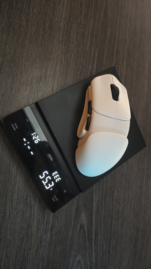 Orbital Pathfinder gaming mouse with various attachments.