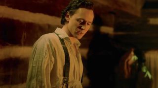 Tom Hiddleston's Thomas talking to Edith inside their cabin in Crimson Peak