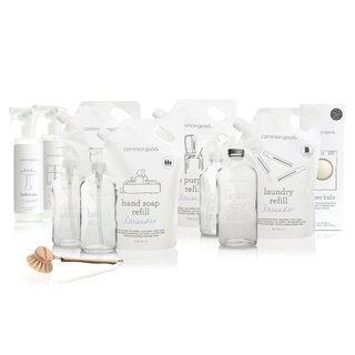 A set of glass refillable bottles and pouches of cleaner from Common Good