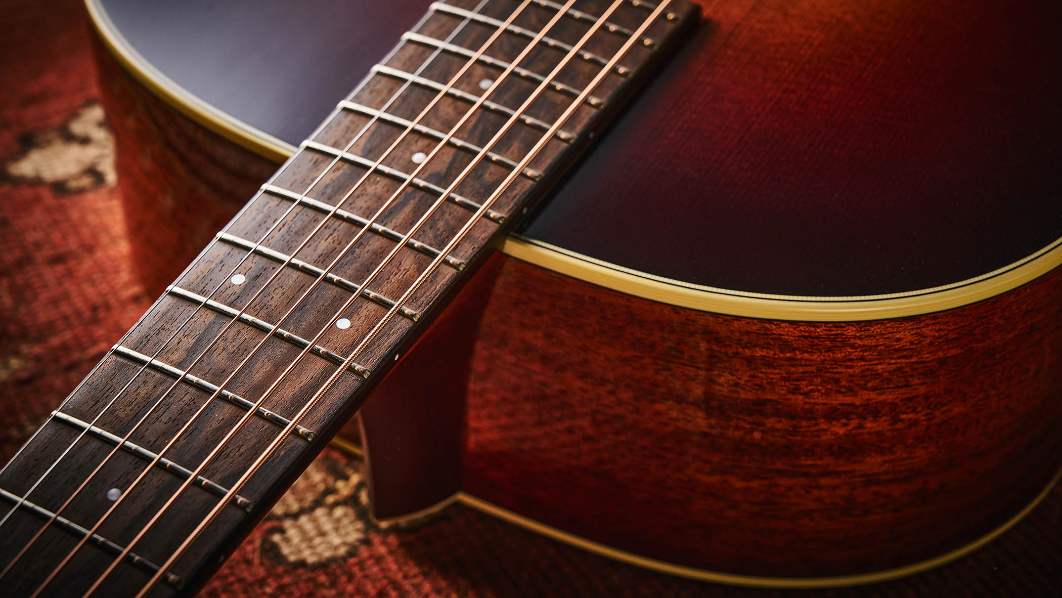 Bourgeois Slope D Standard T/S: Inspired by the J-45, this Touchstone series acoustic has. a beautiful high-gloss finish with a tiger-stripe pickguard