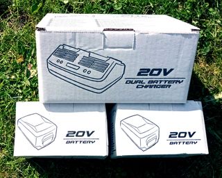 Mountfield lawnmower batteries packaged on lawn