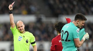 Newcastle's Nick Pope is sent off against Liverpool in the Premier League in February 2023.
