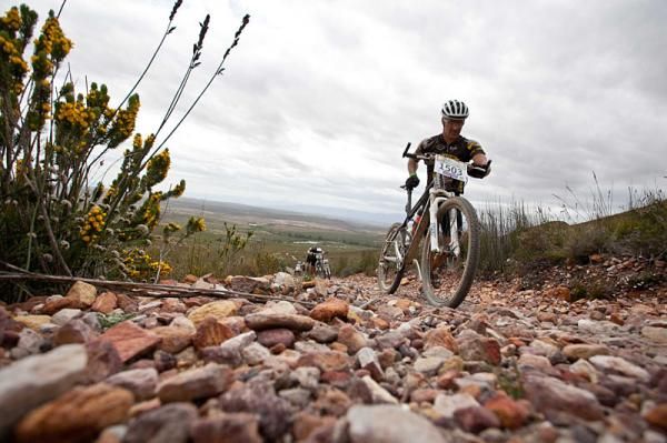 Chris van Zyl of Cape Town pushes his bike