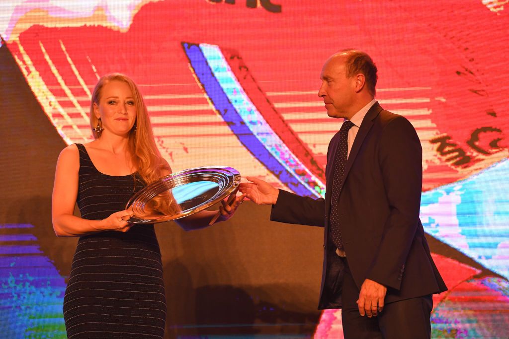 Gracie Elvin accepts the women's time trial world champion award on behalf of Annemiek van Vleuten