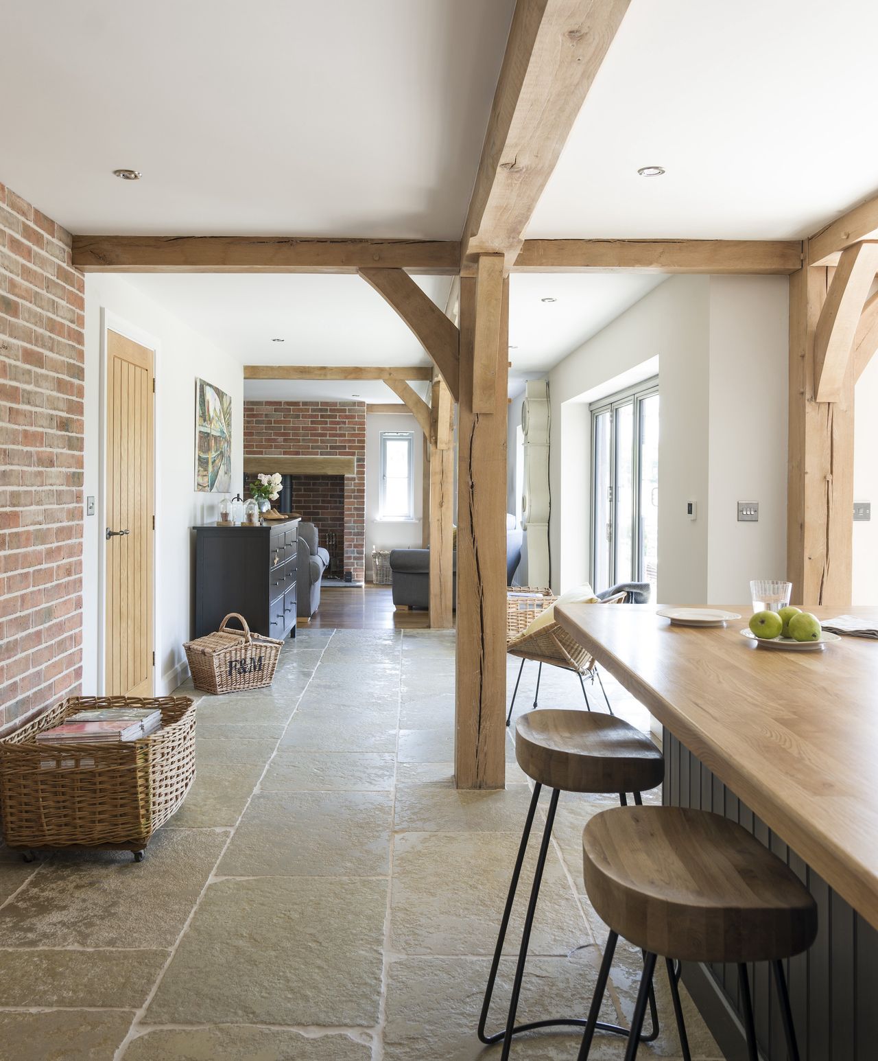 view from kitchen to living room in oak frame home