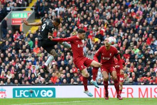 Gabriel Jesus rises to score a header for Arsenal against Liverpool at Anfield in the Premier League in April 2023.