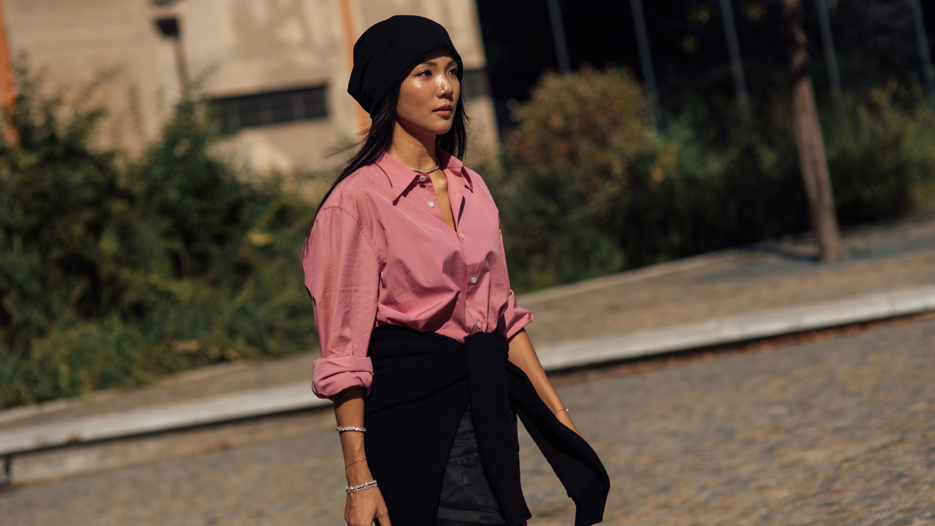 woman wearing button-down and a black skirt