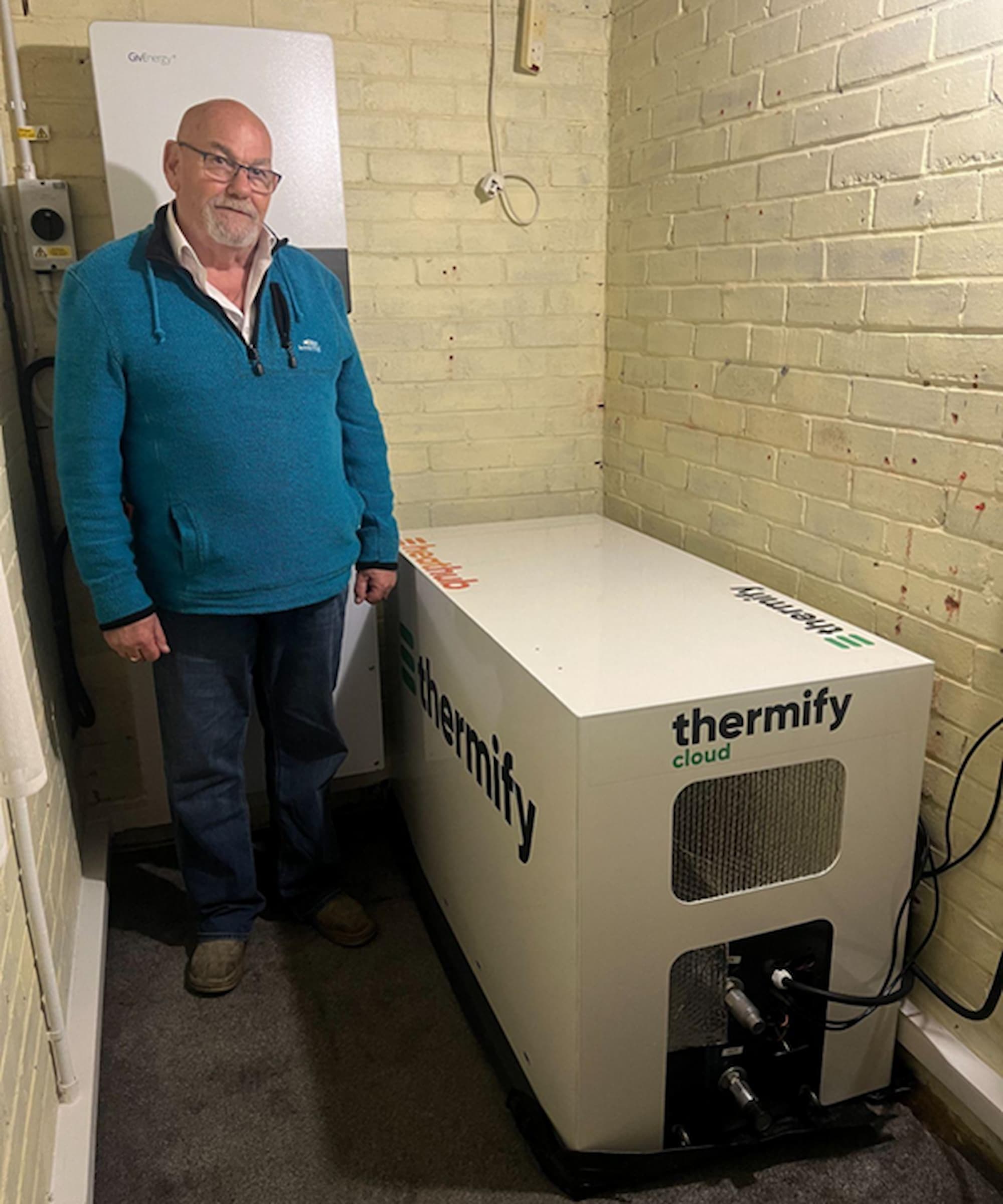 A solar thermal heater being stored in a brick shed