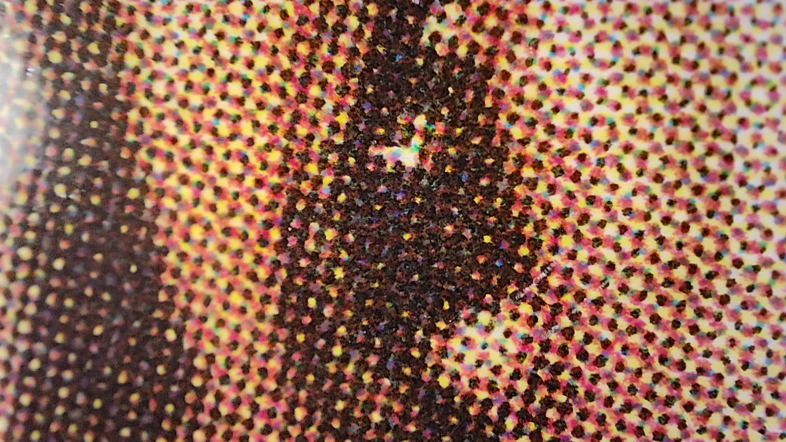 Microscopic photo of a magazine taken using the Realme GT 2 Pro