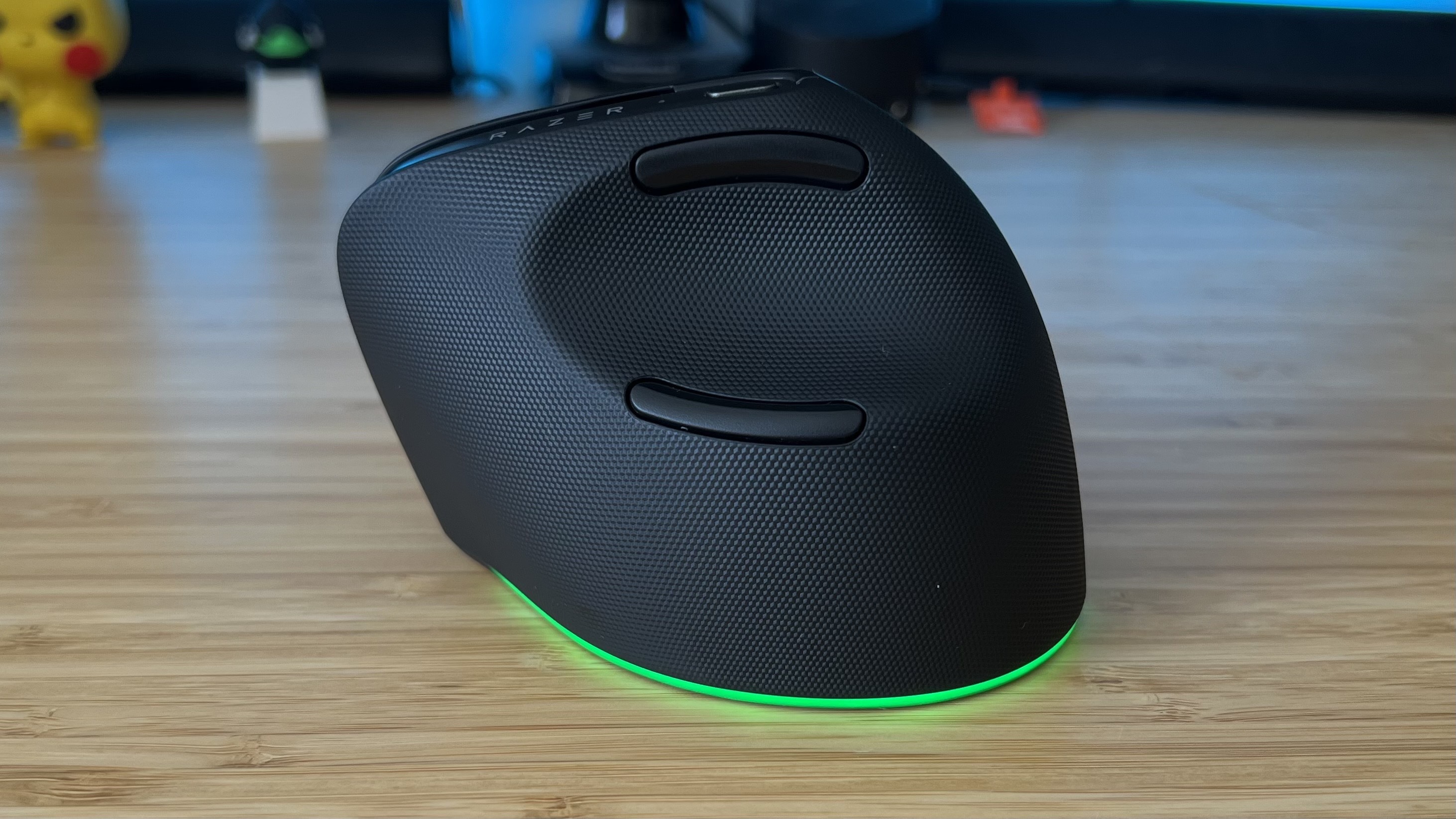 Side view of Razer Pro Click V2 Vertical Edition showing thumb indent and side buttons