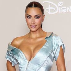 Kim Kardashian styled a vintage satin gown from Dior Spring 2000 by John Galliano at the All's Fair premiere
