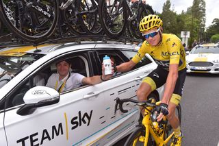 Portal driving into Paris with Chris Froome at the 2017 Tour de France