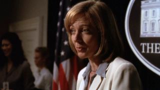 C.J. Cregg (Allison Janney) addresses the press on The West Wing.