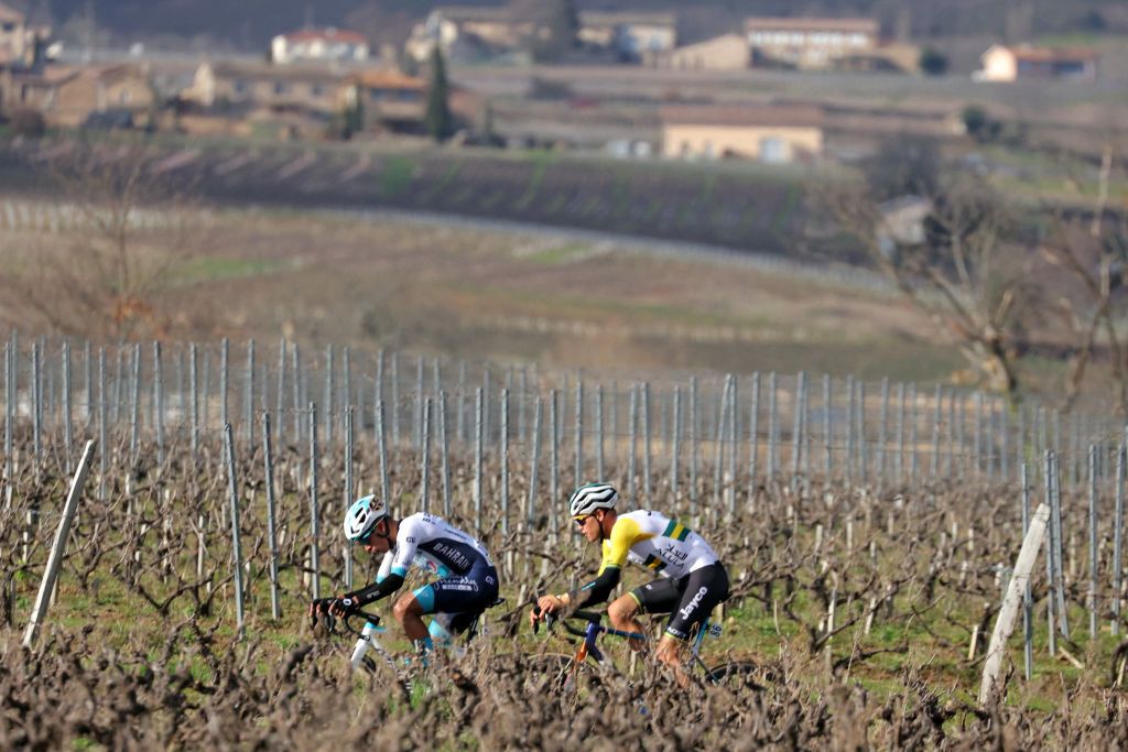 Bahrain Victorious's Colombian cyclist Santiago Buitrago (L) and Team Jayco Alula's Australian cyclist Lucas Plapp ride in the lead during the 4th stage of the Paris-Nice cycling race, 183 km between Chalon-sur-Saone and Mont Brouilly, on March 6, 2024. (Photo by Thomas SAMSON / AFP)