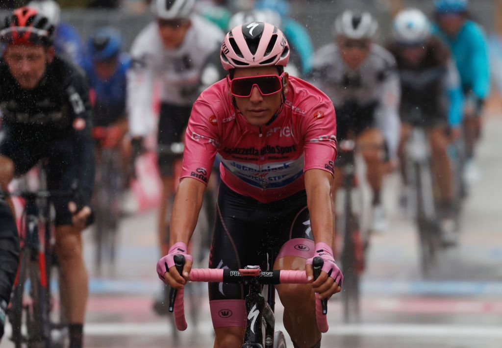 Team Deceuninck Portugals rider Joao Almeida wearing the Pink Jersey crosses the finish line in the 12th stage of the Giro dItalia 2020 cycling race a 204kilometers route between Cesenatico and Cesenatico on October 15 2020 Photo by Luca Bettini AFP Photo by LUCA BETTINIAFP via Getty Images