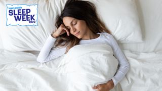  a photo of a woman in bed sleeping
