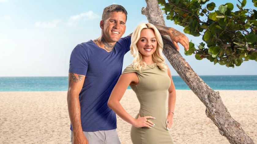 Johny &amp; Chloe posing on a beach in a promotional image for ’90 Day Fiance: The Other Way&#039; season 7.
