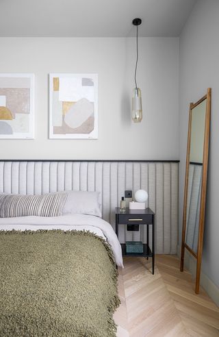 neutral bedroom with padded headboard