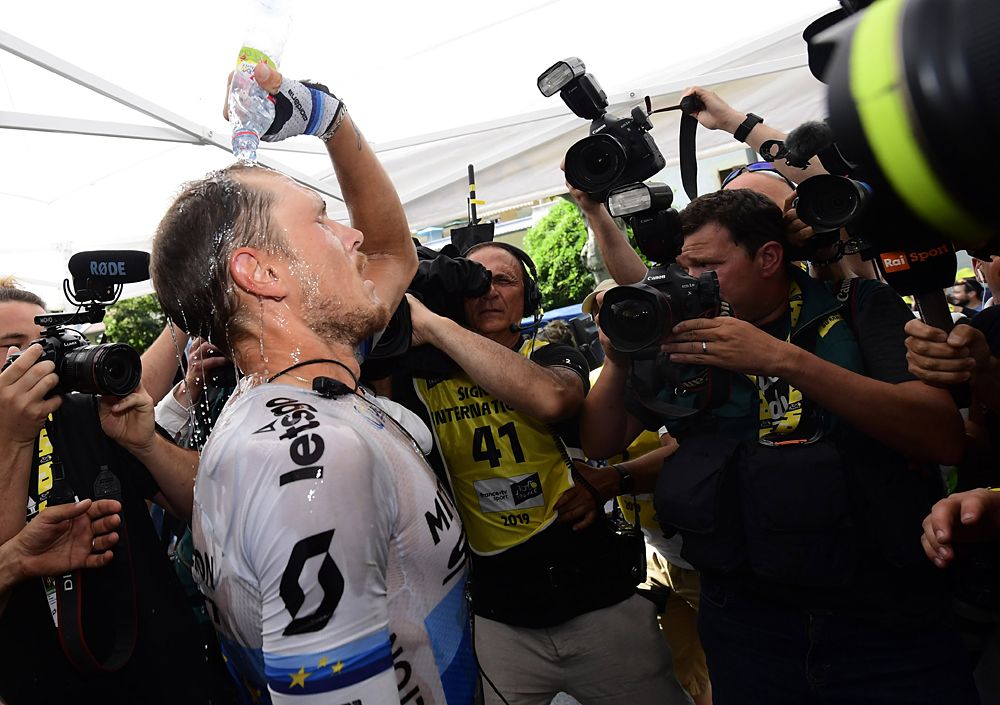 Matteo Trentin (Mitchelton-Scott) celebrates a solo victory on stage 17 at the Tour de France