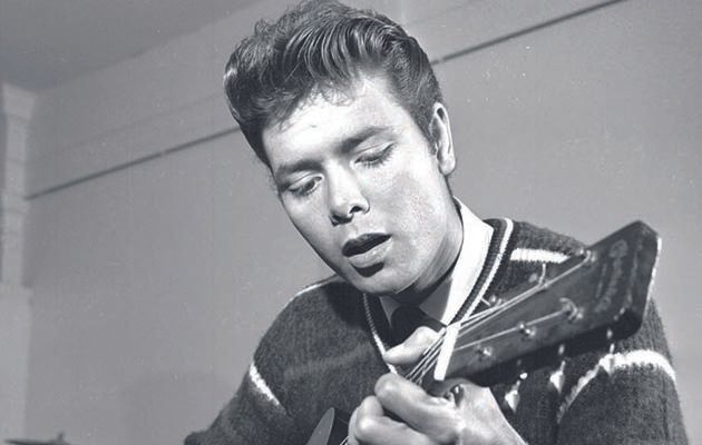 Cliff Richard in 1962 playing the guitar. Watch The Cliff Richard Story on Friday 25th May