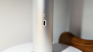 The integrated USB-C port on the stem of the Dyson Solarcycle Morph Desk