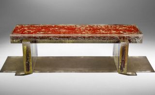 A 20th century wood bench preserved in resin.